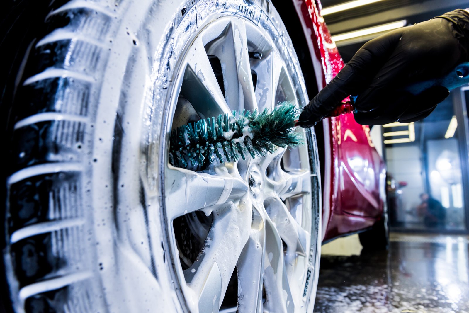 cleaning-car-wheel-with-brush-water-4-scaled.jpg
